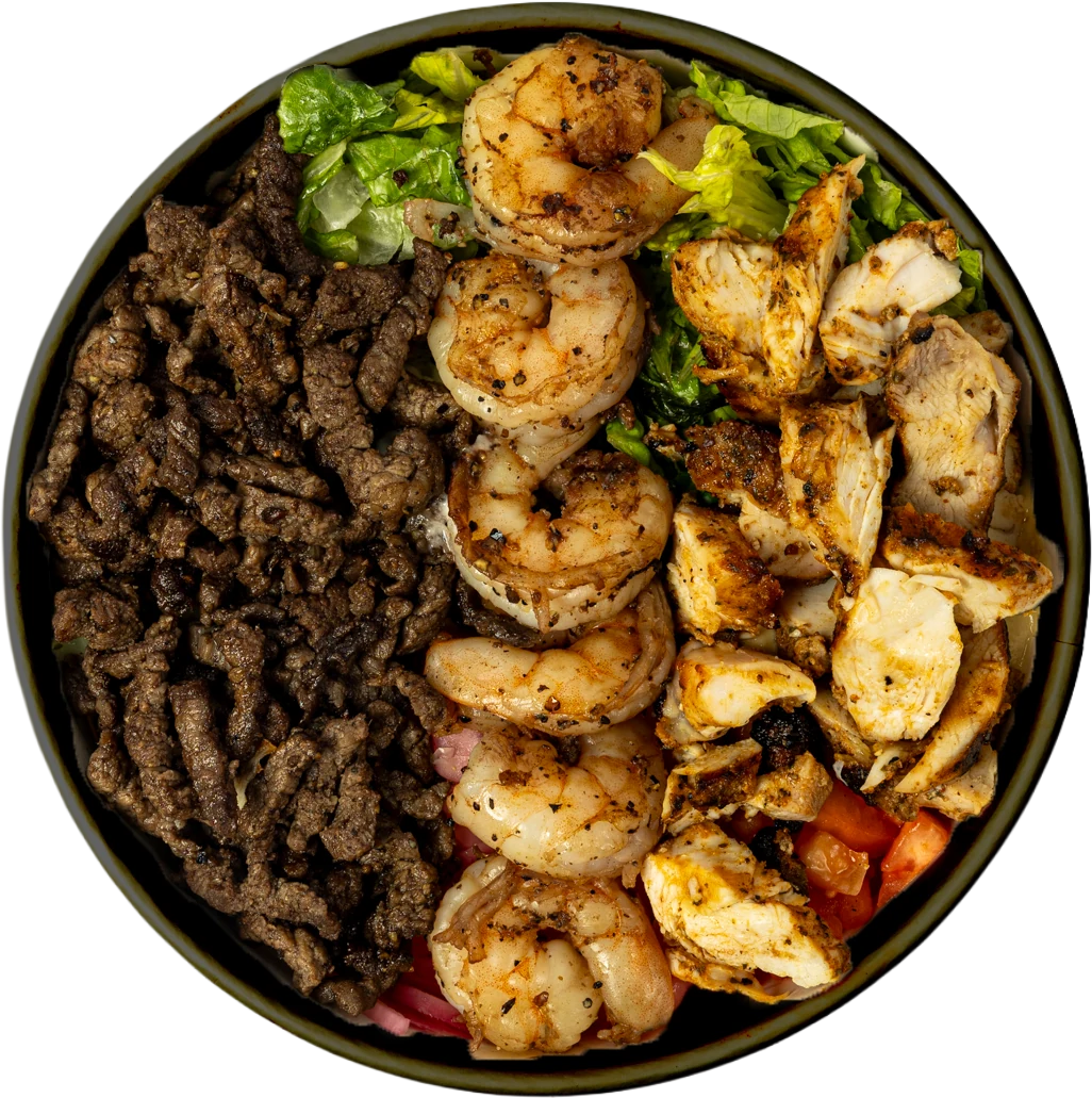Overhead Feast Bowl with grilled steak, shrimp and grilled chicken at Hummus & Garlic Waterford
